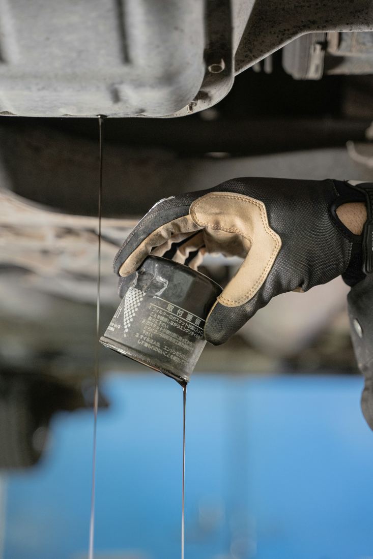 Fresh oil being poured during an oil change
